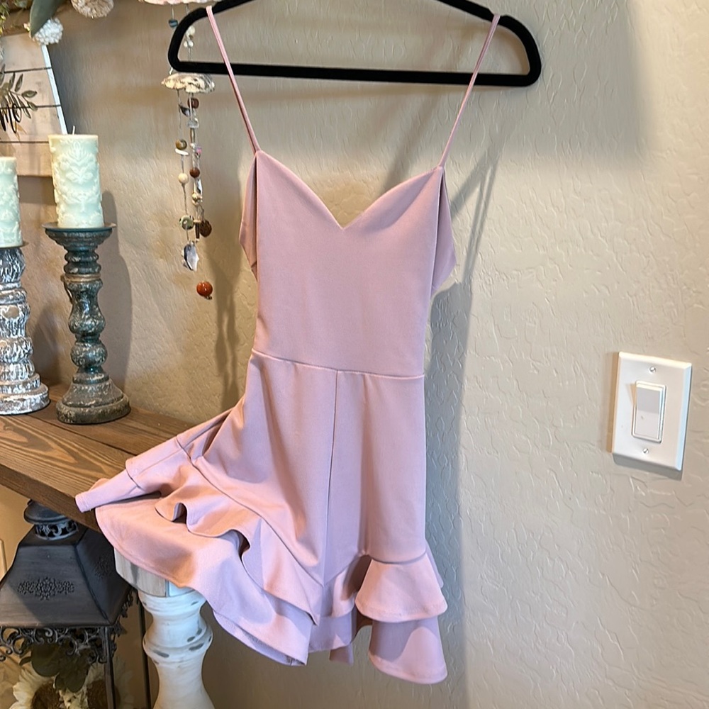 Pink ruffled short dress that is shorts